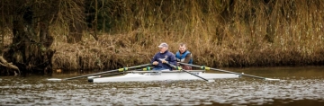 2 Mixed Ability Rowers out on the water